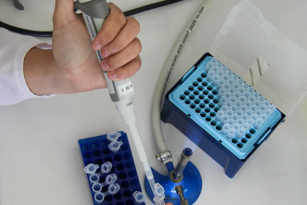 Scientist working with advanced biotechnology laboratory equipment